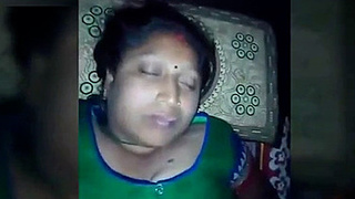 Indian husband awakens sleeping wife for intimate encounter