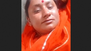 A village woman reveals her intimate parts for her spouse in a video