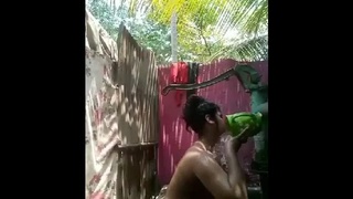 Sensual outdoor showering in the village