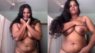Indian wife reveals her large breasts and intimate area to her partner
