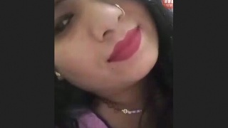A stunning Asian woman enjoys putting on a show