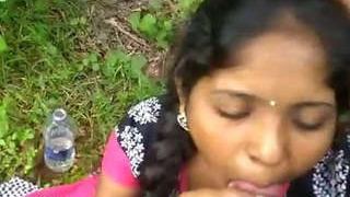 Indian babe performs oral sex in the woods