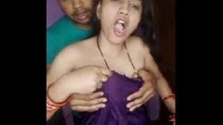 Aroused brother-in-law sensually fondles attractive sister-in-law's breasts