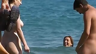 This adorable brunette nudist chicks is smearing lotion