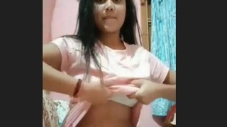 Indian college girl reveals big breasts during webcam performance