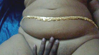 Mature Indian woman's vagina orally pleasured and stimulated with fingers