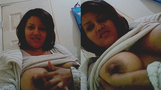 Aunty flaunts her breasts and nipples in a sensual display