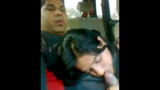 An Indian college student performs oral sex in a vehicle