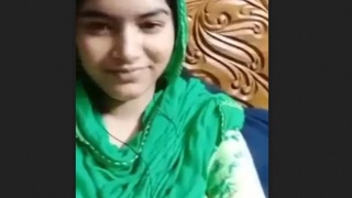 Cute blonde girl reveals her beauty in the village