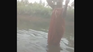 Desi aunt's sensual outdoor bath leads to intimate encounter with lover