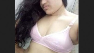 A stunning girl from a picturesque village takes a bath