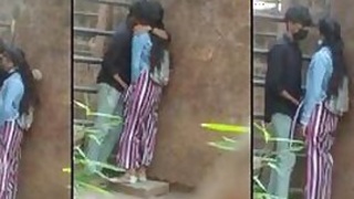 Open Desi mms clip of Indian lovers caught kissing at wall