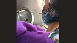 Discreetly taped couple engaging in sexual activity on a train's restroom caught by fellow passengers