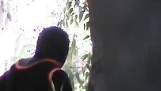 Hidden live camera catches an adult teenage girl having sex outdoors behind her house