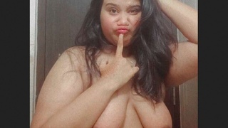A stunning and voluptuous Bangladeshi girl entices with her attractive physique