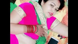 Curvy homemaker Manju Aunty's steamy display on the bed