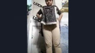 Video of an Indian girl taking a bath