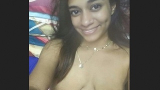 Large-breasted woman takes a bath