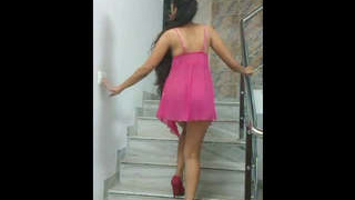 A stunning Indian girlfriend strips on a staircase