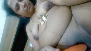 A stunning woman indulges in a pleasurable oral sex and passionate intercourse while recording herself on the bed