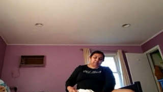 Mature Indian woman (bbw) transitions clothing (part 1)