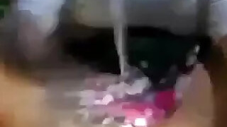 The horny girl squeezes her tight pussy so hard