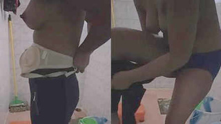 Indian woman switches outfits in restroom