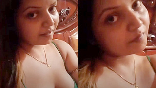 Indian girl with large breasts performs live