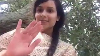 A young and adorable South Asian girl displays her attractive genitalia