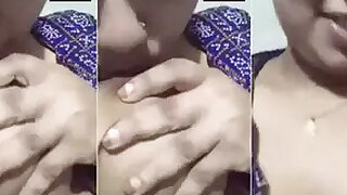 Bengali girl sucks her own tits