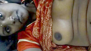 A busty Indian girl performs a live show with explicit content