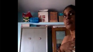 Secretly recorded bhabhi's nude changing session in videos