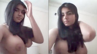 Young Desi girl flaunts her ample breasts and seductive charm