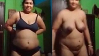 Elderly wife reveals her nude form on camera, featuring a voluptuous figure