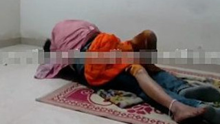 Madhavi's intimate encounter with her boyfriend while her husband watches