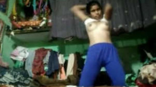 A charming South Asian woman pleasures herself with her lover's recorded footage