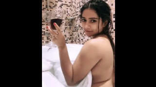 Dipsikha Roy, an enticing Indian beauty, relaxes in a bath