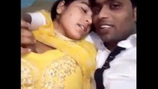 Indian couples passionately kissing and squeezing breasts