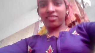 Indian sister rubbing her large vagina with her hand