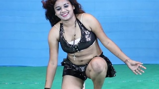 A stunning girl performs a tantalizing dance