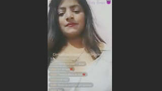Shruti's sensual tango performance with voluptuous breasts