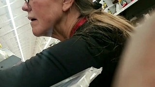 Elderly volleyball player in white socks and spandex gets intimate