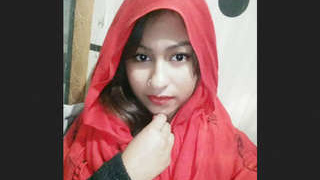 Aroused Indian girl pleasuring herself with a sex toy