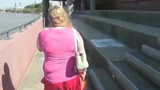 American girl strolls along the banks of the Ohio River on webcam