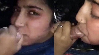 A charming Indian woman pleasures her boyfriend with oral sex