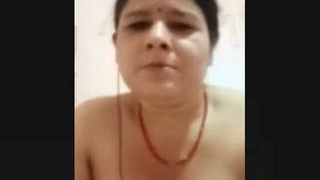 Nepali mature woman displays and self-pleasures during video call with spouse