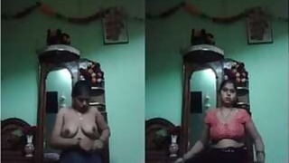 Bowie takes off her sari and shows off her naked body.