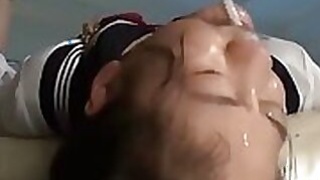 Asian schoolgirl gives perky deep throat and rides dick