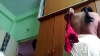 Indian older aunt Vani filmed by her spouse while wearing a blouse