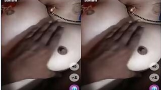 Hot Bhabhi presses her breasts and masturbates her pussy with a huge Dildo Part 1